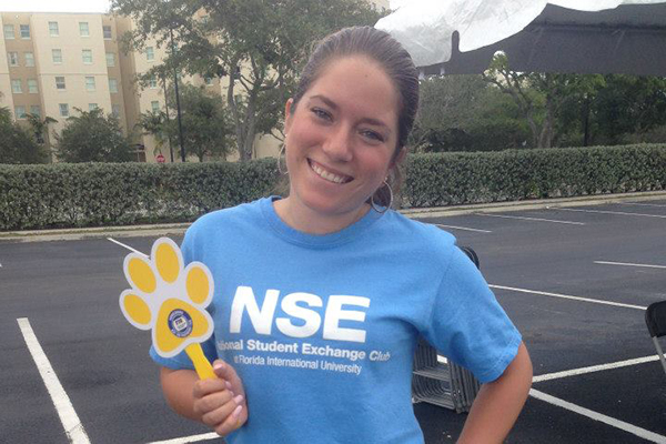 FIU student that is wearing a National Student Exchange tshirt
